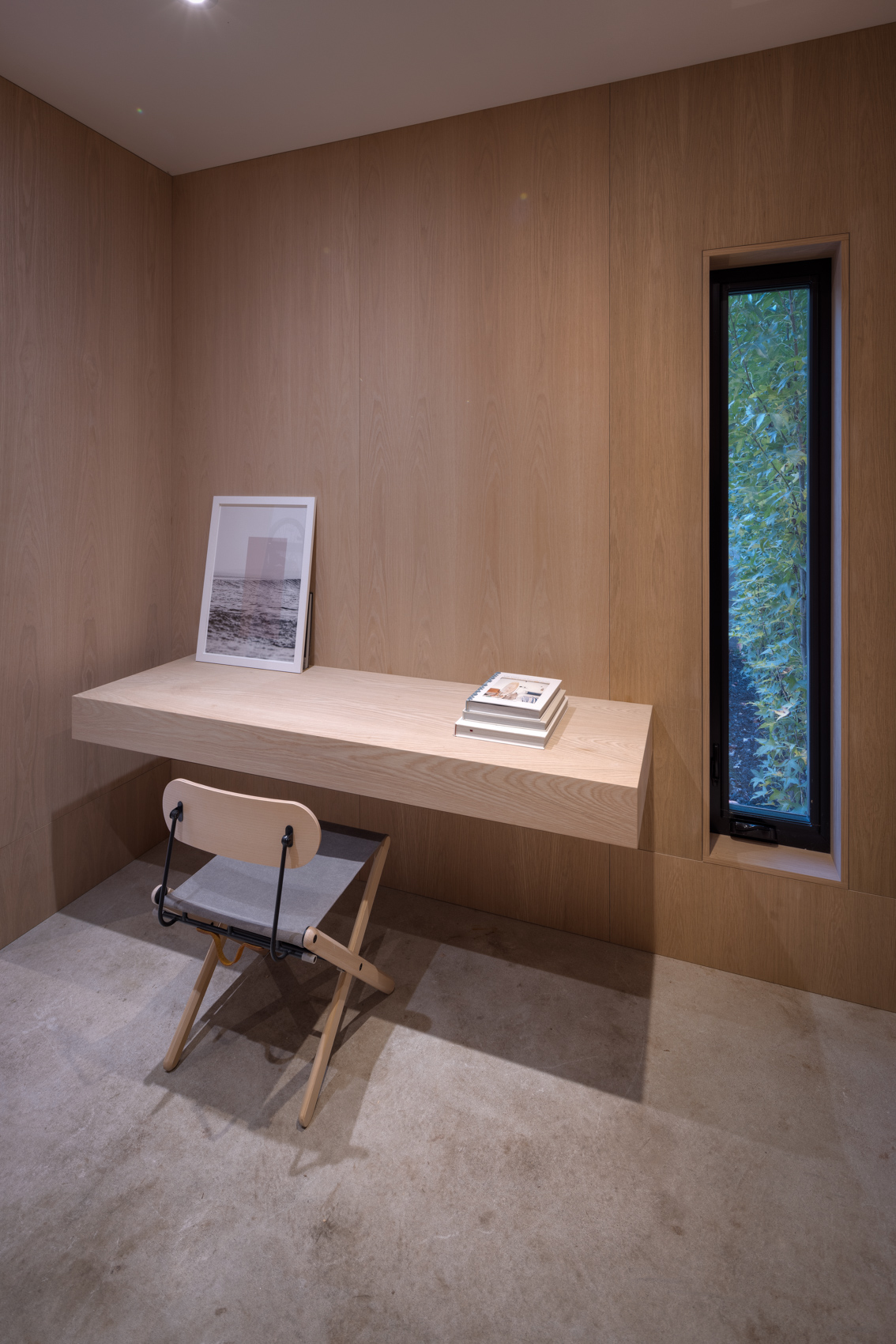 Modern office space with floating desk. 