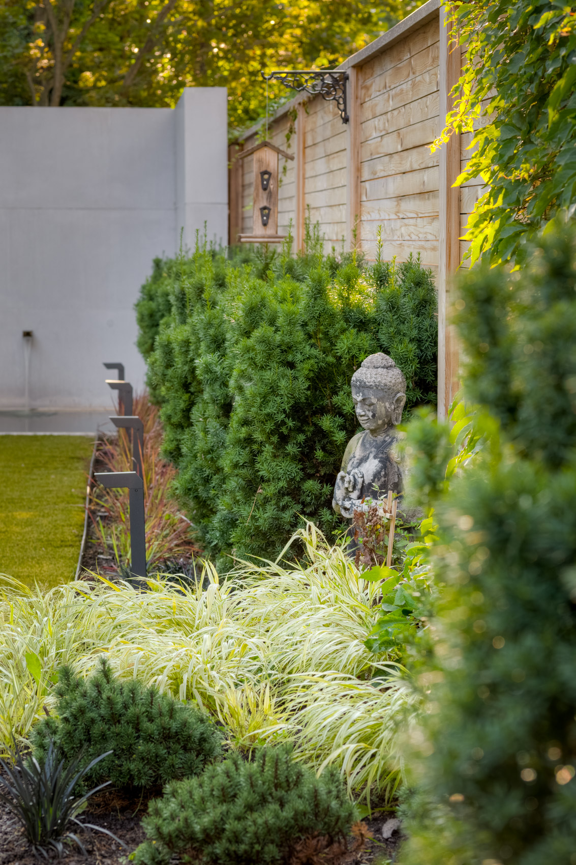 detail of wood fencing with plantings