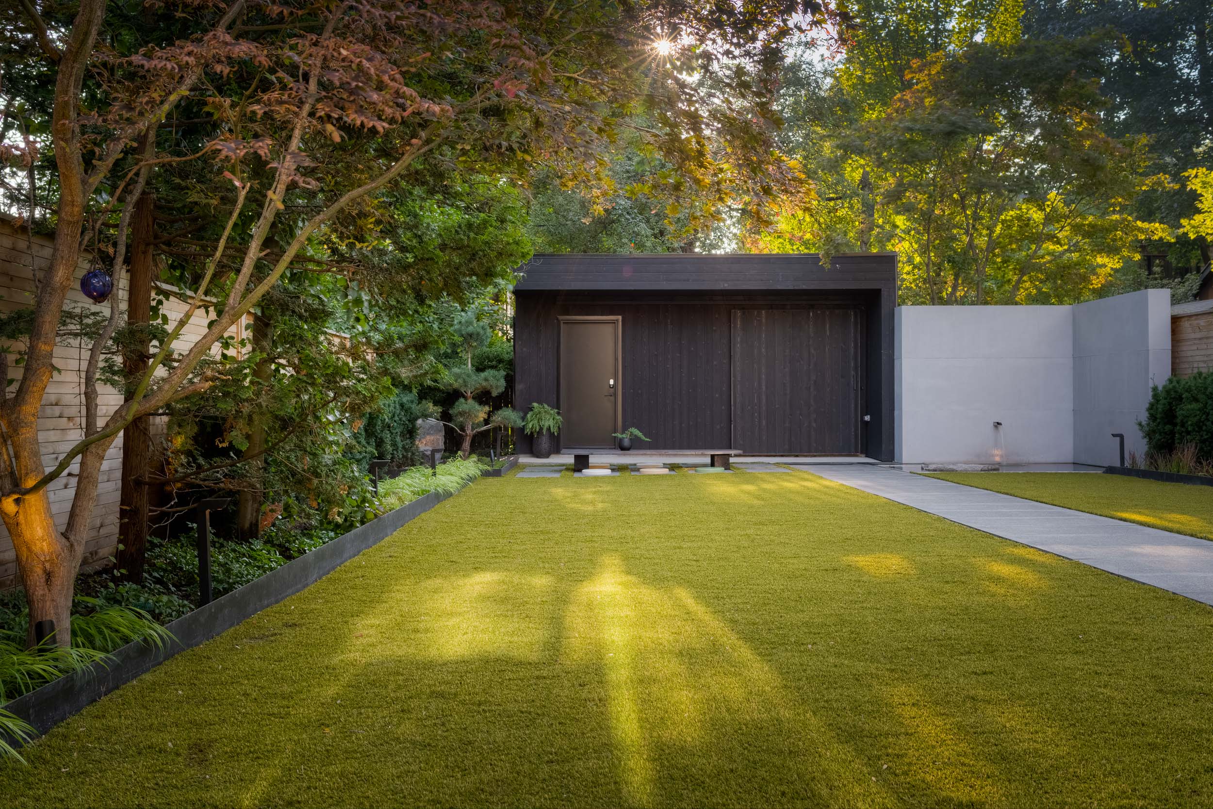 Zen yard with plantings and grass